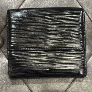 Louis Vuitton Black Epi Tri-Fold Wallet. Does show signs of wear see pics.